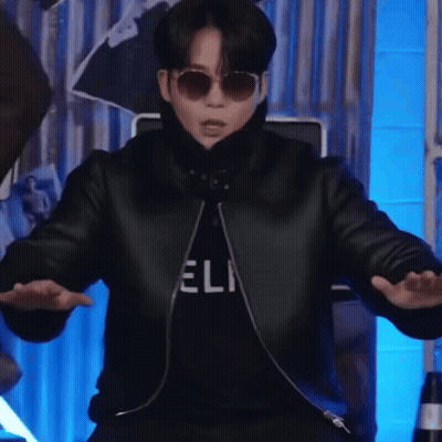 Man In Sunglasses And Jacket Saying Eli GIF