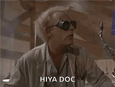 Man In Sunglasses And Lab Coat Playing Saxophone Saying Hiya Doc GIF