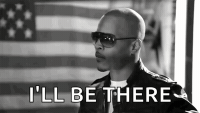 Man In Sunglasses And Leather Jacket Saying I'll Be There In Front Of Flag GIF