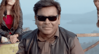 Man In Sunglasses And Leather Jacket Smiling GIF