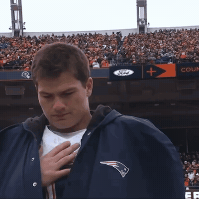 Man In Sunglasses And Necklace Smiling Says Prime Time GIF