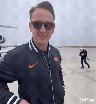 Man In Sunglasses And Nike Jacket Smiling GIF