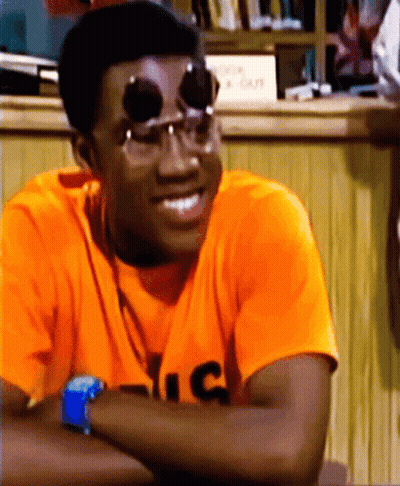 Man In Sunglasses And Orange Shirt With C GIF