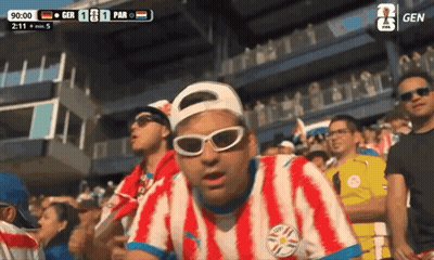 Man In Sunglasses And Paraguay Shirt In Crowd GIF