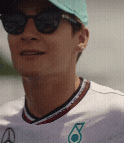Man In Sunglasses And Petronas Shirt GIF