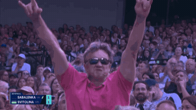Man In Sunglasses And Pink Shirt Applauding At Tennis GIF