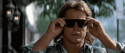 Man In Sunglasses And Plaid Shirt Adjusting Sunglasses GIF