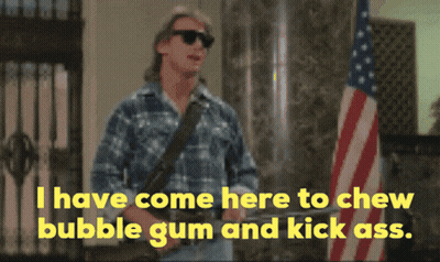 Man In Sunglasses And Plaid Shirt Says I Have Come Here To Chew Bubble Gum And Kick Ass GIF