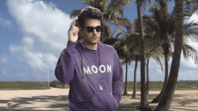 Man In Sunglasses And Purple Moon Sweatshirt GIF