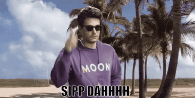 Man In Sunglasses And Purple Moon Sweatshirt Says Sipp Dahhhh GIF