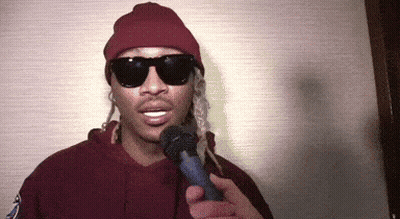 Man In Sunglasses And Red Beanie Holding Microphone GIF