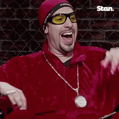 Man In Sunglasses And Red Jacket Saying Wicked GIF