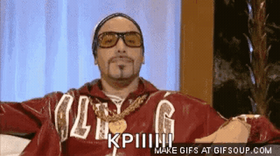 Man In Sunglasses And Red Jacket Sitting On Couch Making Funny Face GIF