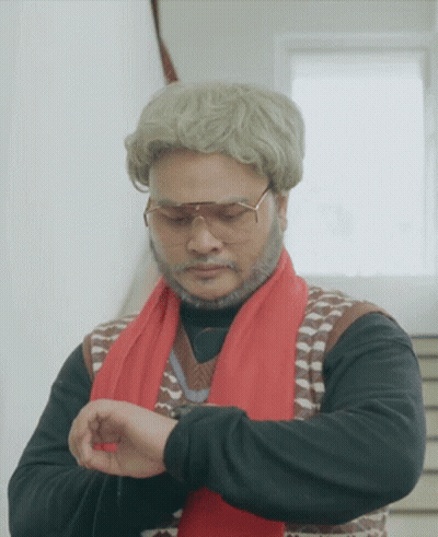 Man In Sunglasses And Red Scarf Checking Watch GIF
