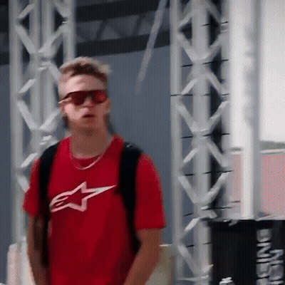 Man In Sunglasses And Red Star Shirt GIF