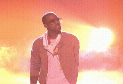Man In Sunglasses And Scarf At Sunset GIF