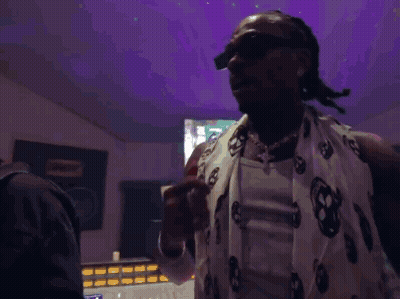 Man In Sunglasses And Scarf Hand On Mouth GIF