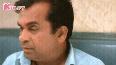 Man In Sunglasses And Scarf Talking About Maintaining Distance GIF