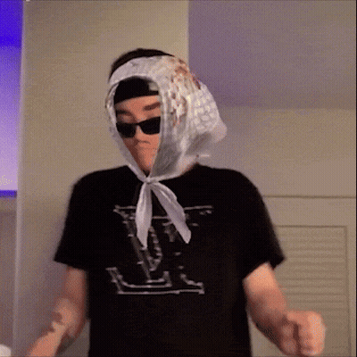 Man In Sunglasses And Scarf With V GIF
