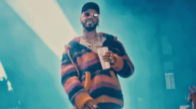 Man In Sunglasses And Striped Jacket Holding Coffee GIF