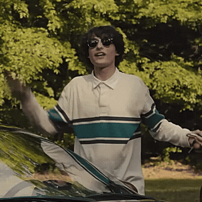 Man In Sunglasses And Striped Shirt By Car GIF