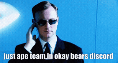 Man In Sunglasses And Suit On Phone Saying Just Ape Team In Okay Bears Discord GIF
