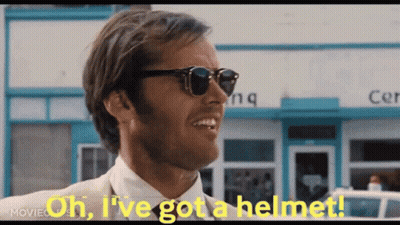 Man in Sunglasses and Suit Saying Oh Ive Got a Helmet