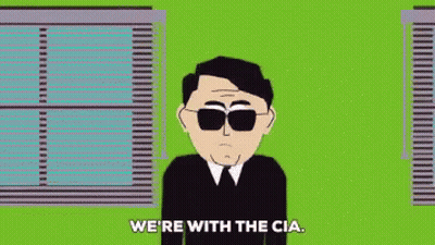 Man In Sunglasses And Suit Says We're With The CIA GIF