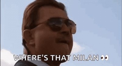 Man In Sunglasses And Suit Talking About Milan GIF