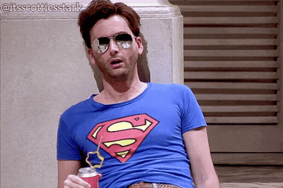 Man In Sunglasses And Superman T-Shirt GIF