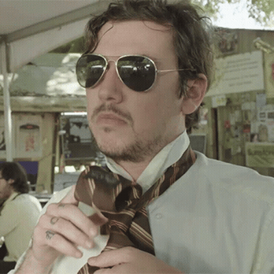 Man In Sunglasses And Tie With Wrist Tattoo GIF