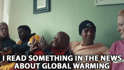Man In Sunglasses And Towel Saying I'm Heatin Up In This Sun GIF
