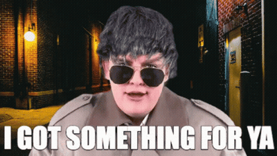 Man In Sunglasses And Trench Coat Says I Got Something For Ya GIF