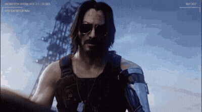 Man In Sunglasses And Vest In Front Of Microtech Hydra Screen GIF