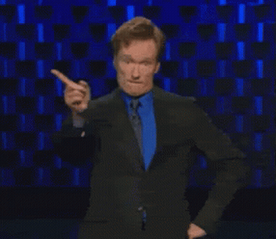 Man In Sunglasses And Watch Sitting On Bed GIF