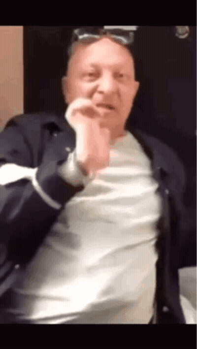 Man In Sunglasses And White Shirt Making Funny Face GIF
