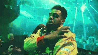 Man In Sunglasses And Yellow Jacket Dancing GIF
