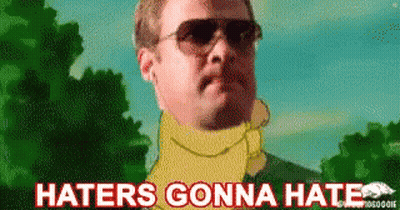 Man In Sunglasses And Yellow Scarf Says Haters Gonna Hate GIF