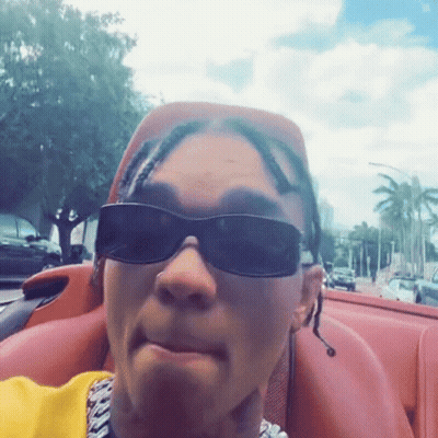 Man In Sunglasses And Yellow Shirt Sitting In Car GIF