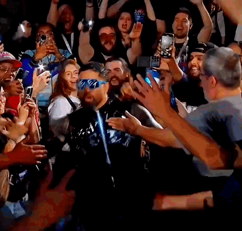 Man In Sunglasses Before Crowd GIF