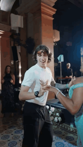 Man In Sunglasses Dancing With Woman GIF