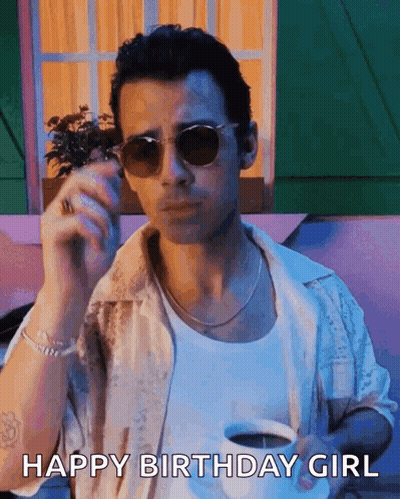 Man In Sunglasses Holding Coffee And Smoking Cigarette GIF