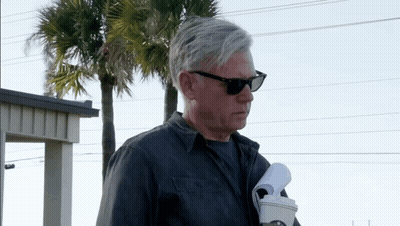 Man In Sunglasses Holding Coffee GIF