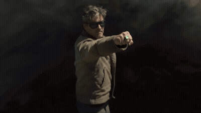 Man In Sunglasses Holding Green Object GIF