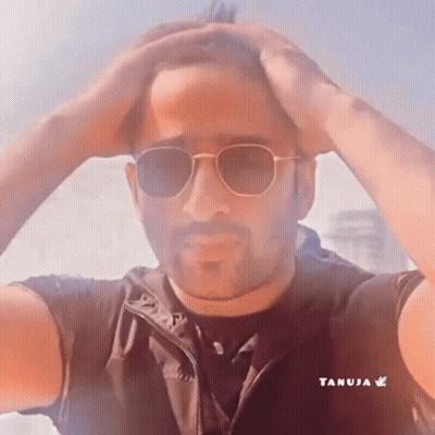 Man In Sunglasses Holding Hand To Forehead GIF