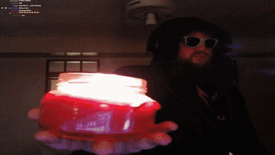 Man In Sunglasses Holding Two Candle Jars GIF