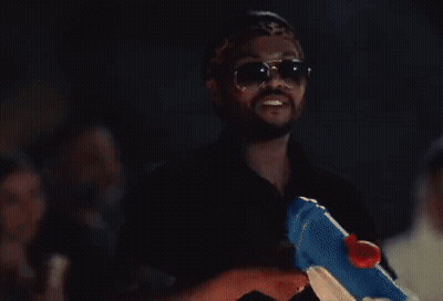 Man In Sunglasses Holding Water Gun GIF