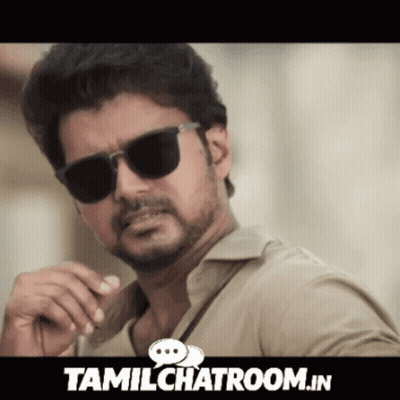 Man In Sunglasses In Front Of Tamilchatroom Banner GIF