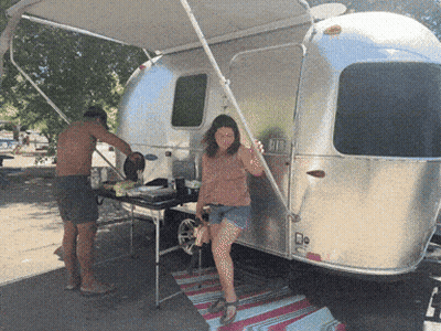 Man In Sunglasses In Front Of Tent GIF