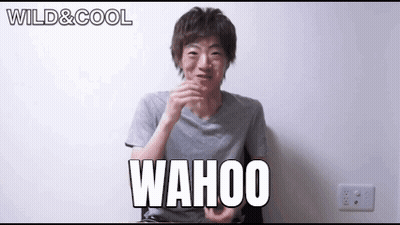 Man In Sunglasses Looking At Phone GIF